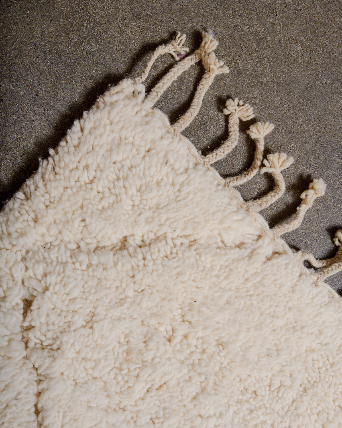 Modern, designer, handcrafted Berber rug from Morocco. Beniourain carpet with minimalist design, natural wool pile and a fluffy texture.